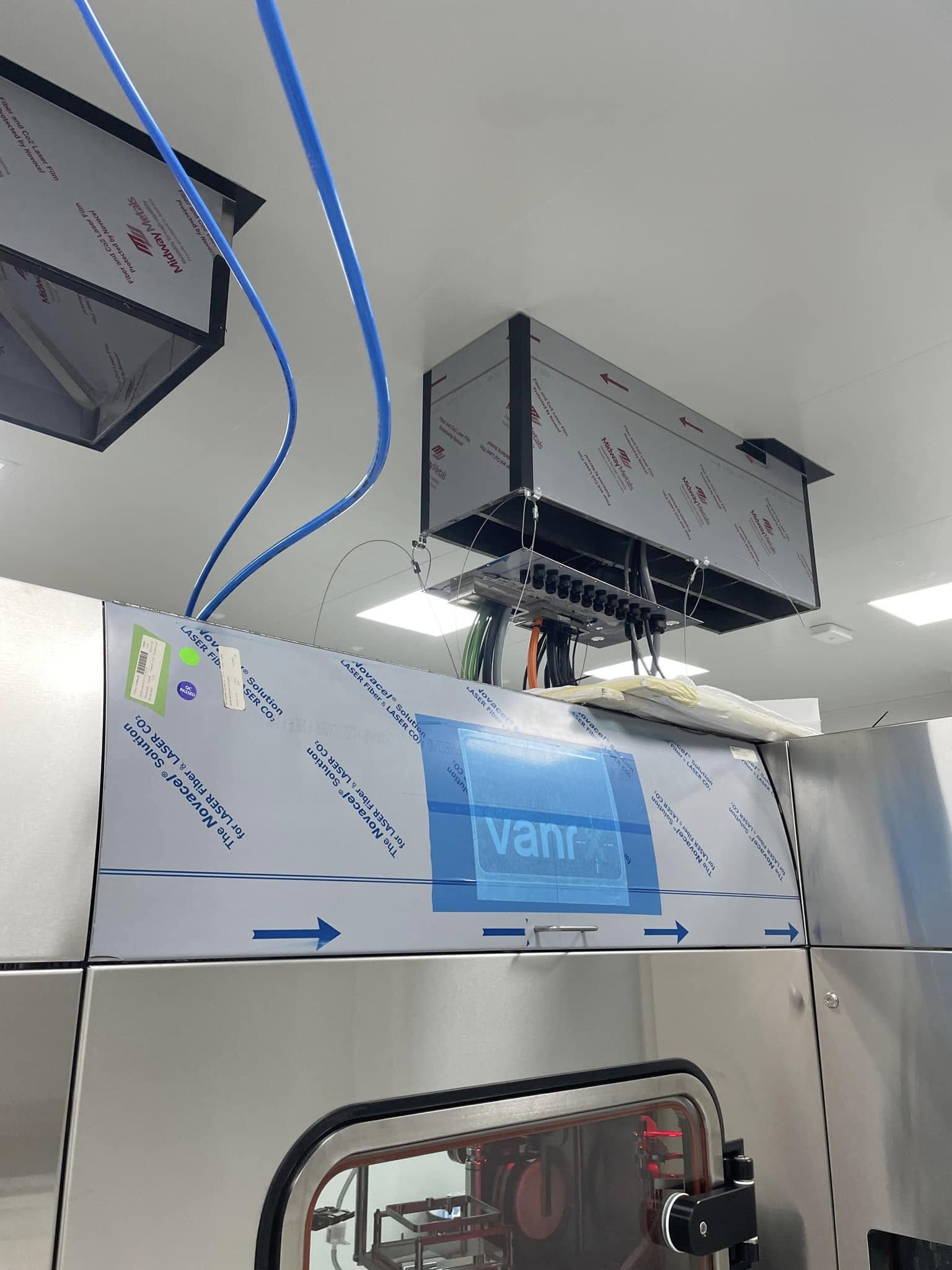 Aseptic filling machine in a cleanroom.