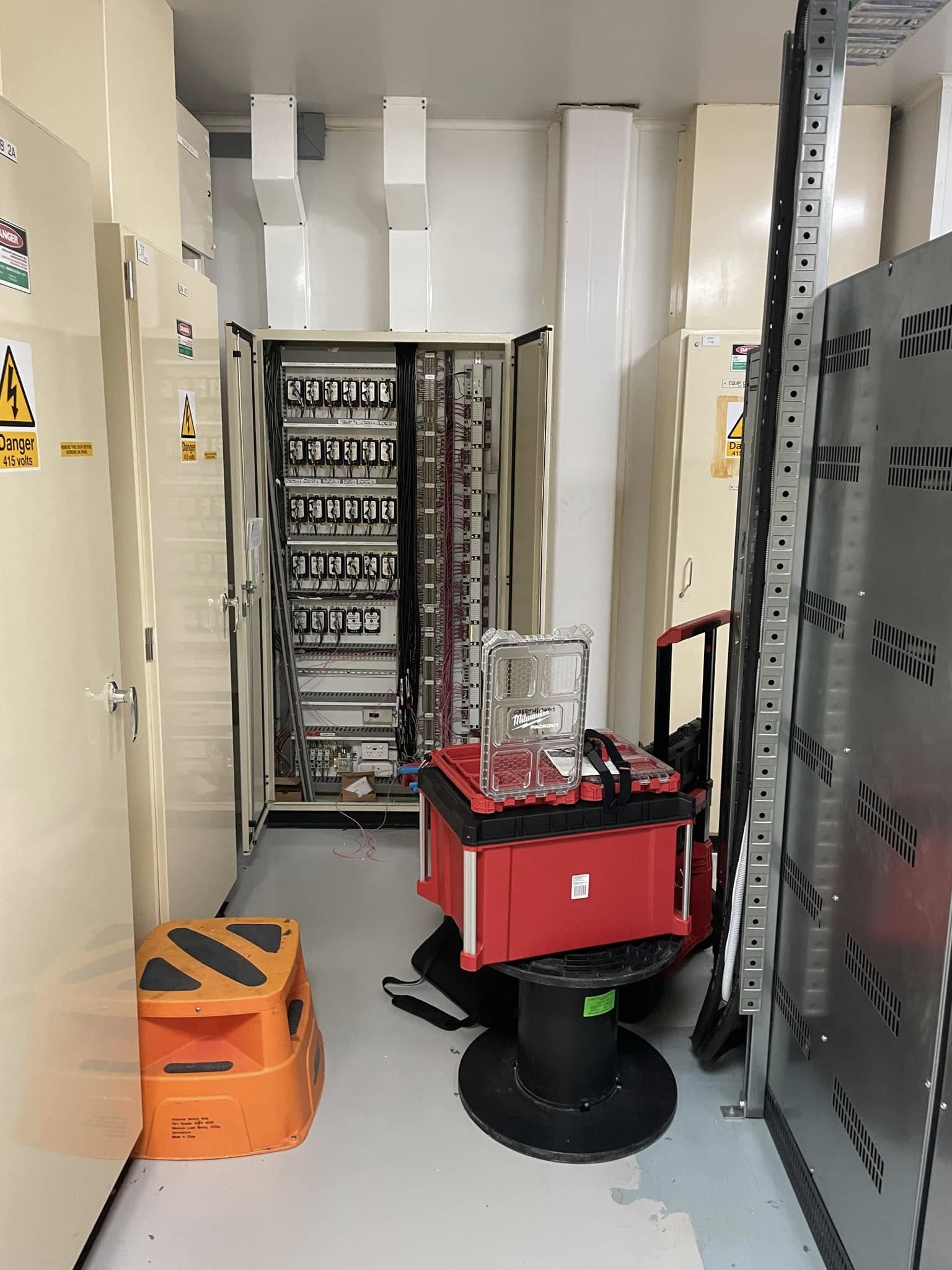 Control cabinet with test equipment during commissioning.